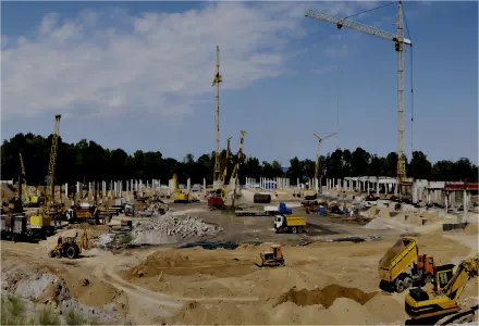 Construction site with sand, cement, and building materials